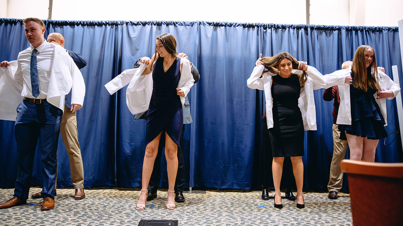 Students are coated at Quinnipiac’s DPT White Coat Ceremony