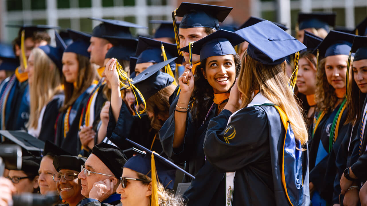 Students turn tassels on their caps