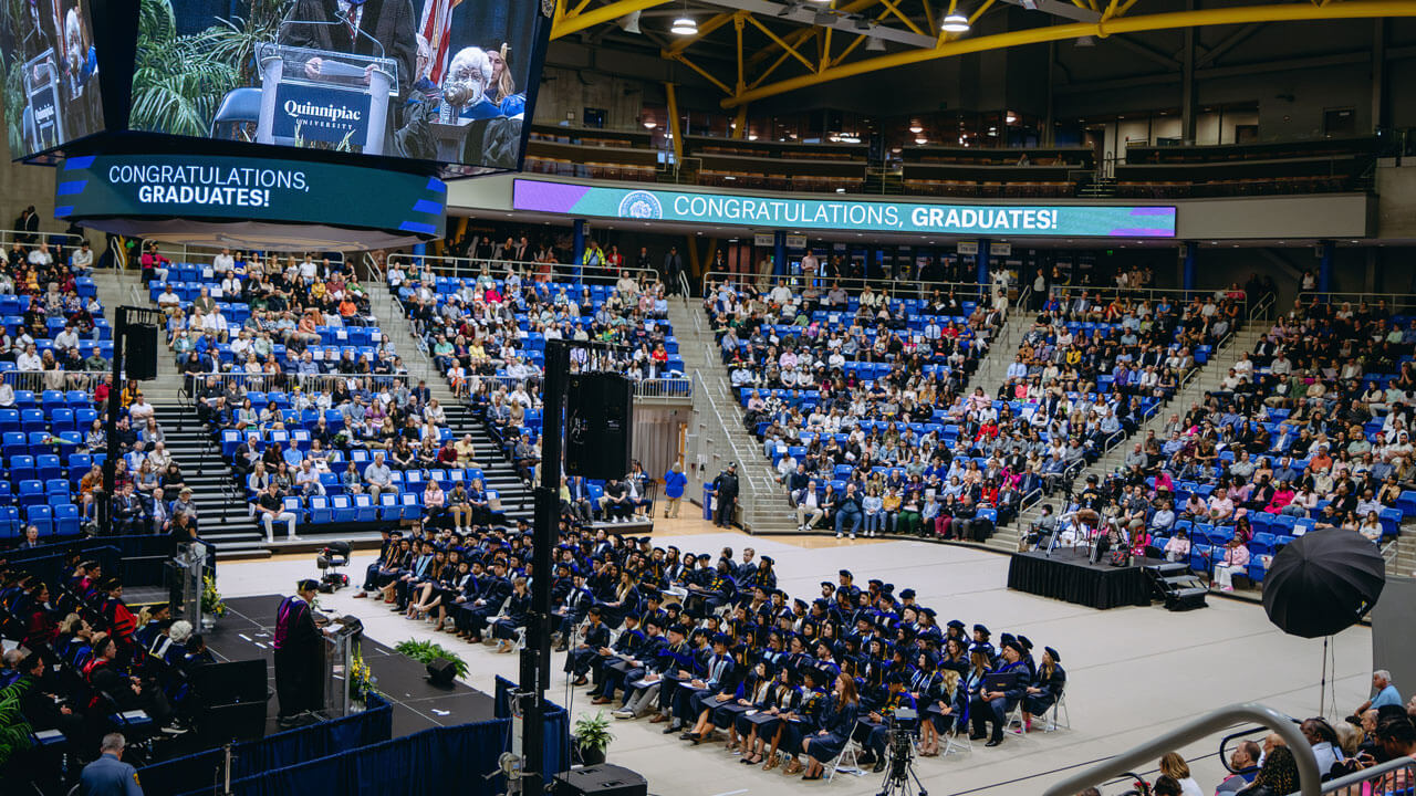 School of Law students sitting in M&T Bank Arena with a crowd