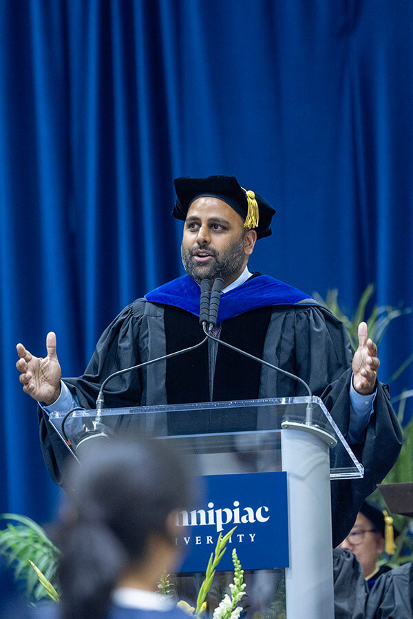 Hartford Mayor Arunan Arulampalam speaks from the Quinnipiac commencement podium