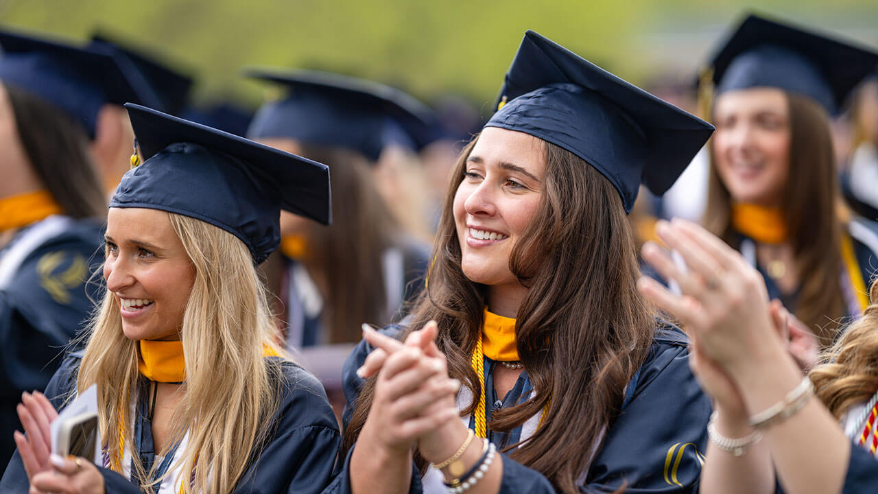 nursing graduates applaud