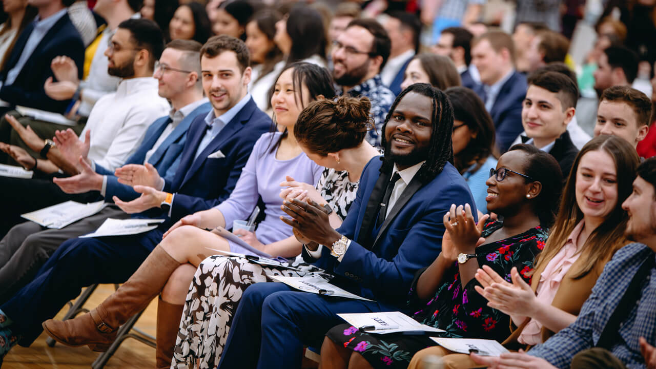 Students clapping at keynote speakers