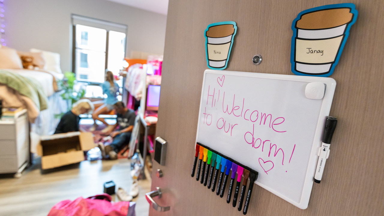 Welcome sign on a dorm room door