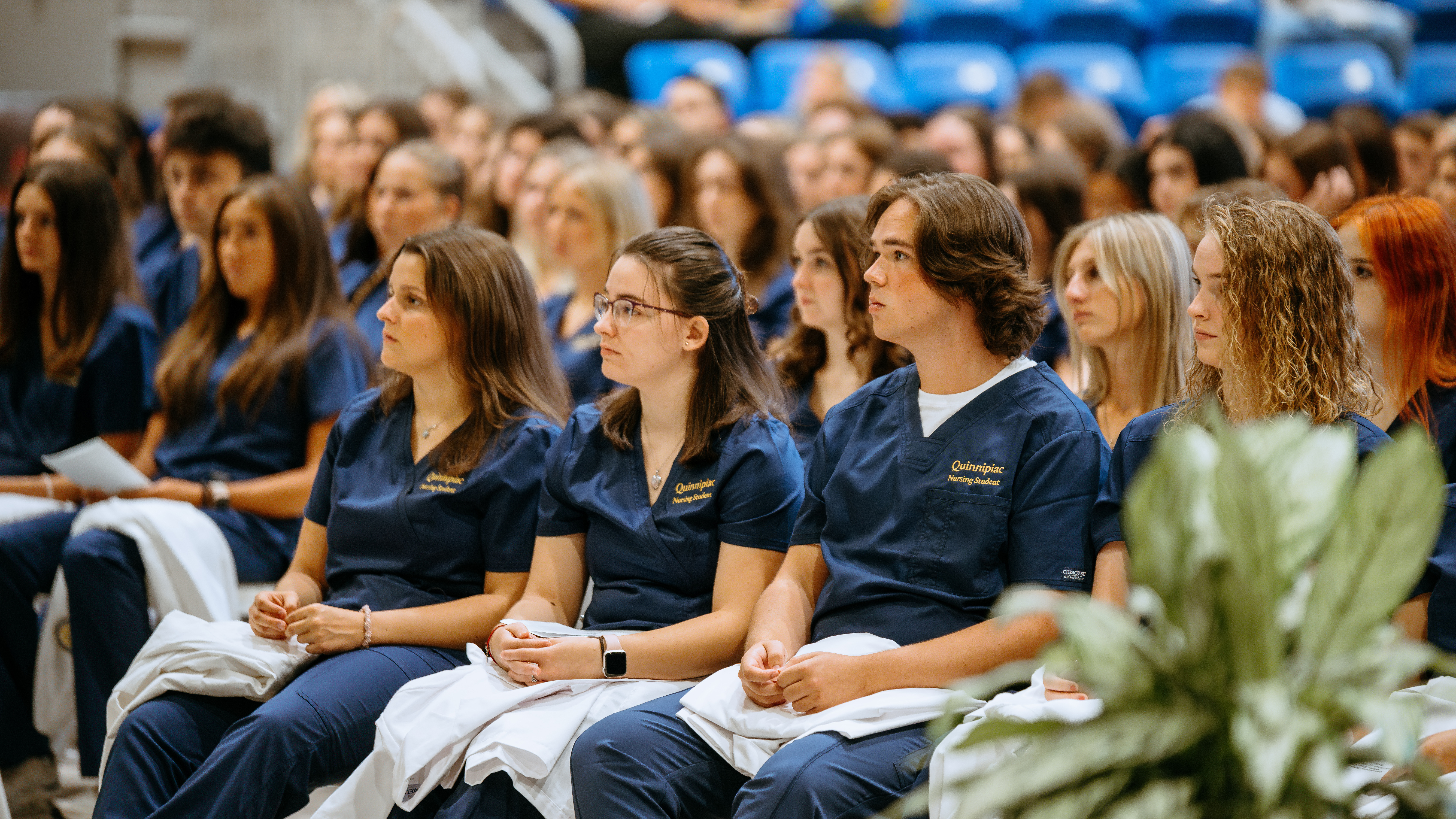 Students sitting in crowd