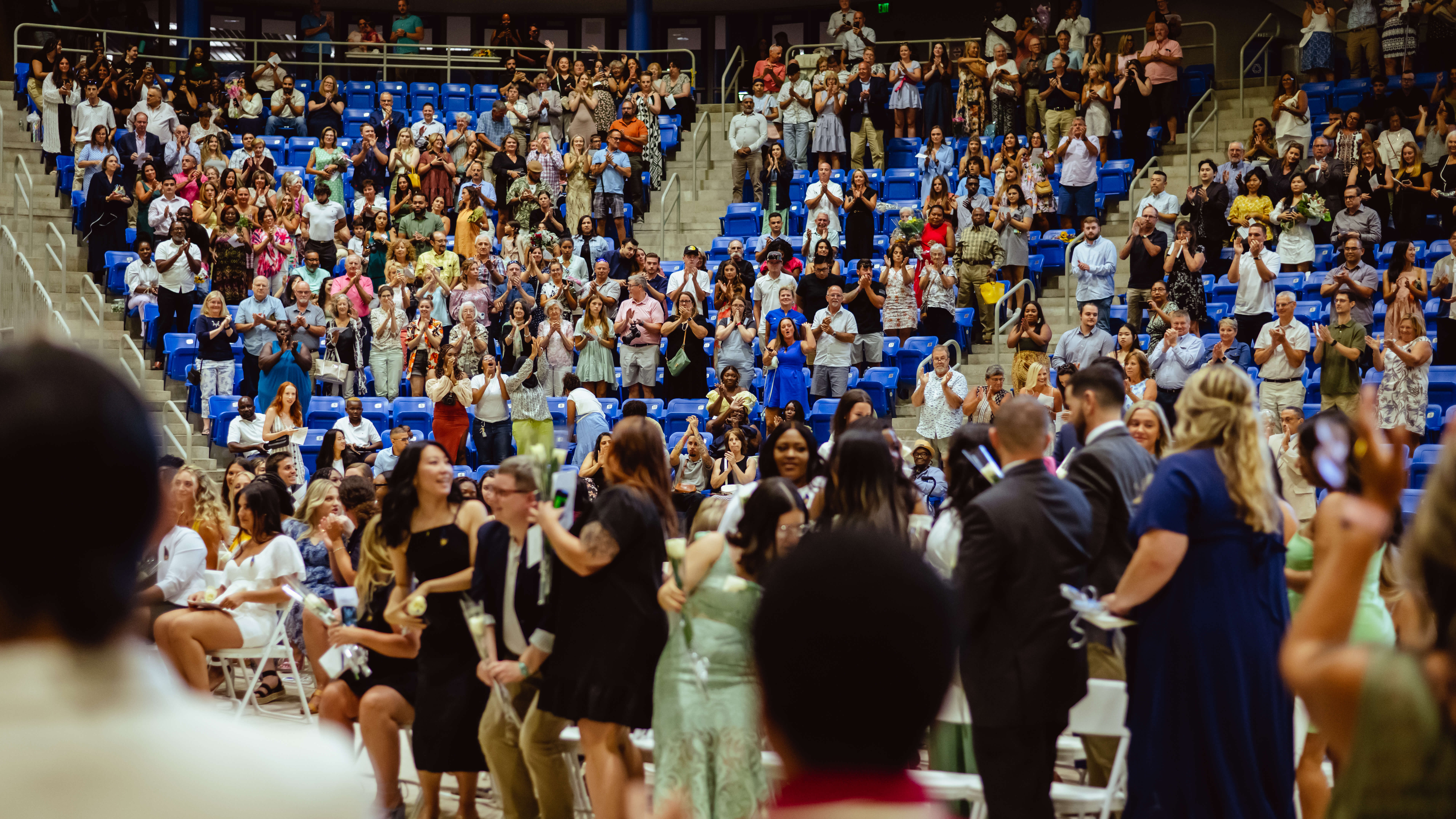 The crowd cheers for all of the recently pinned nurses