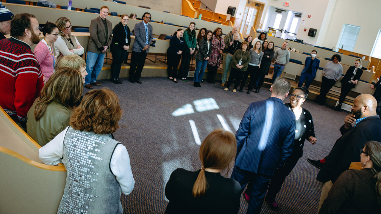 All of the attendees speak in a circle.