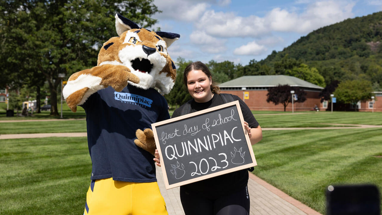 Boomer and a student show their excitement on the first day of classes