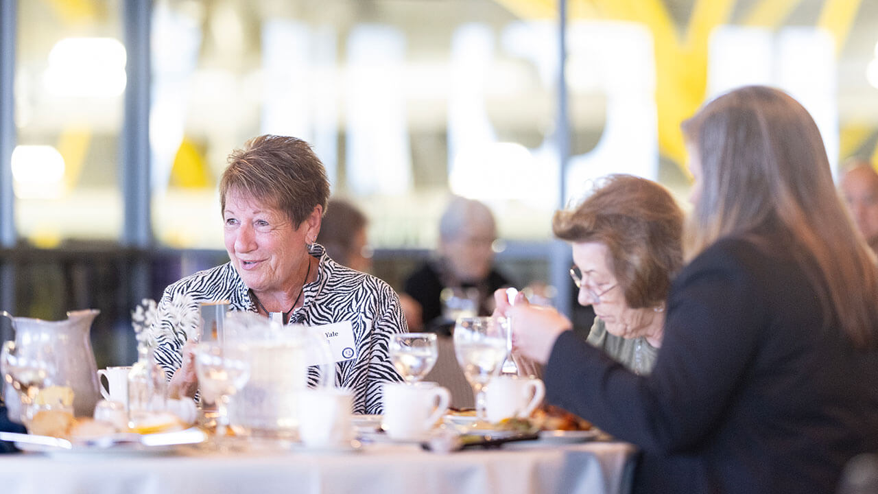 Alumni enjoying food at the Alumni Heritage Luncheon