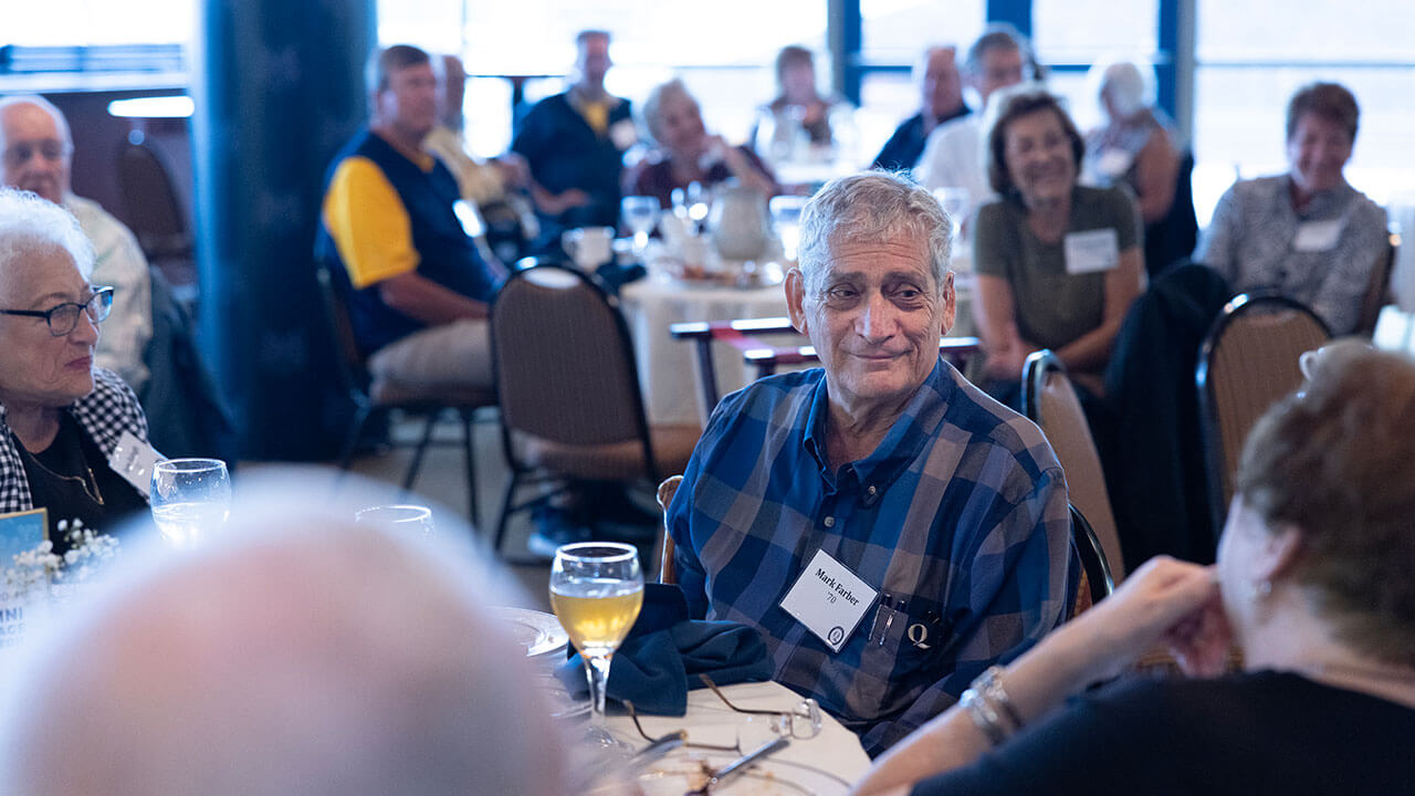 Alumni listening to a speaker at the Heritage Luncheon