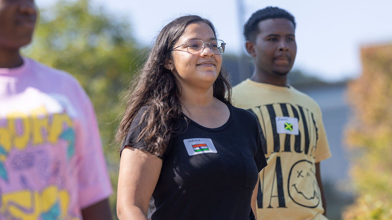 International students walk down Bobcat Way