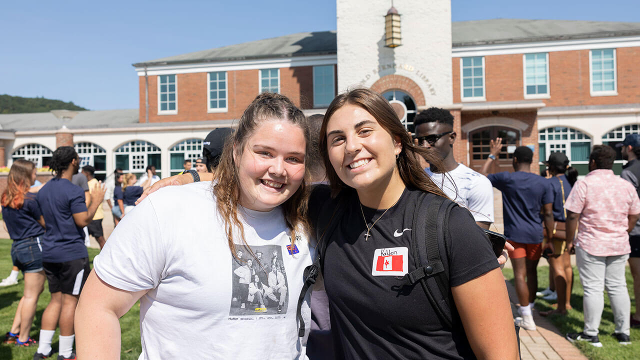 International students take a photo in front of the clocktower