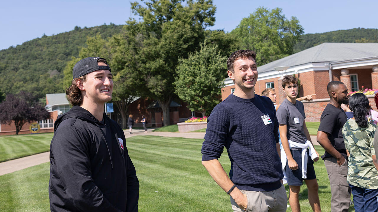 International students walk around the Quad