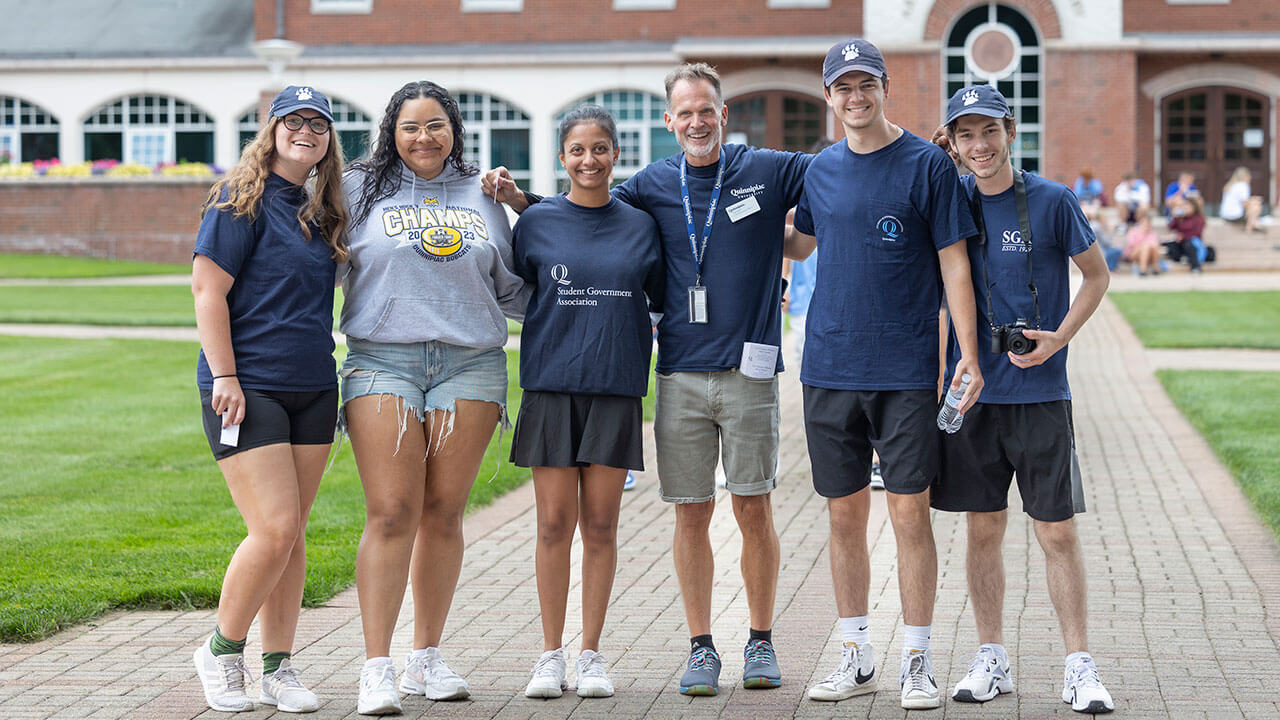 Students and staff members smiling in bobcat spirit wear