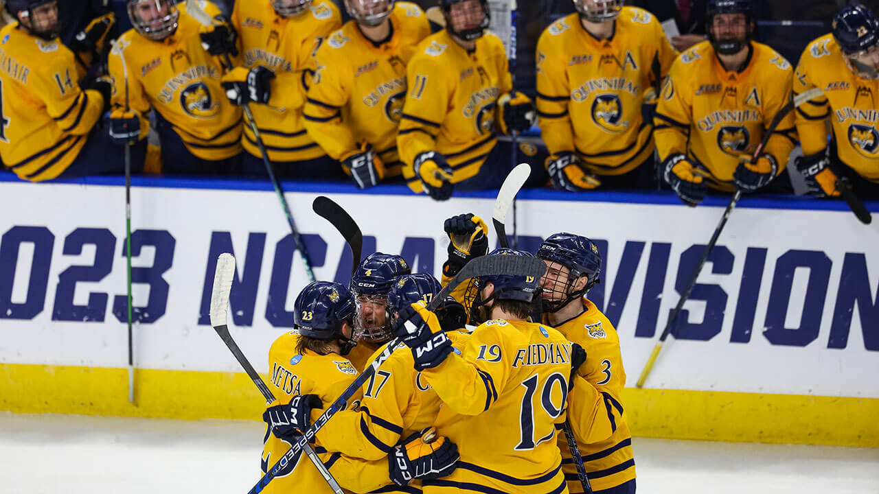 Men's Ice Hockey cheer each other on