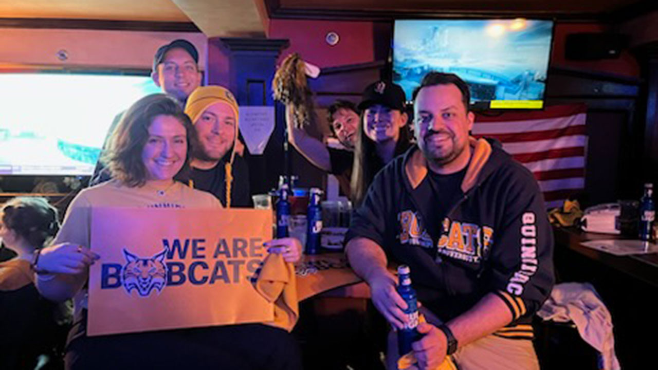 Alumni watch the NCAA semifinals in Hamden, CT