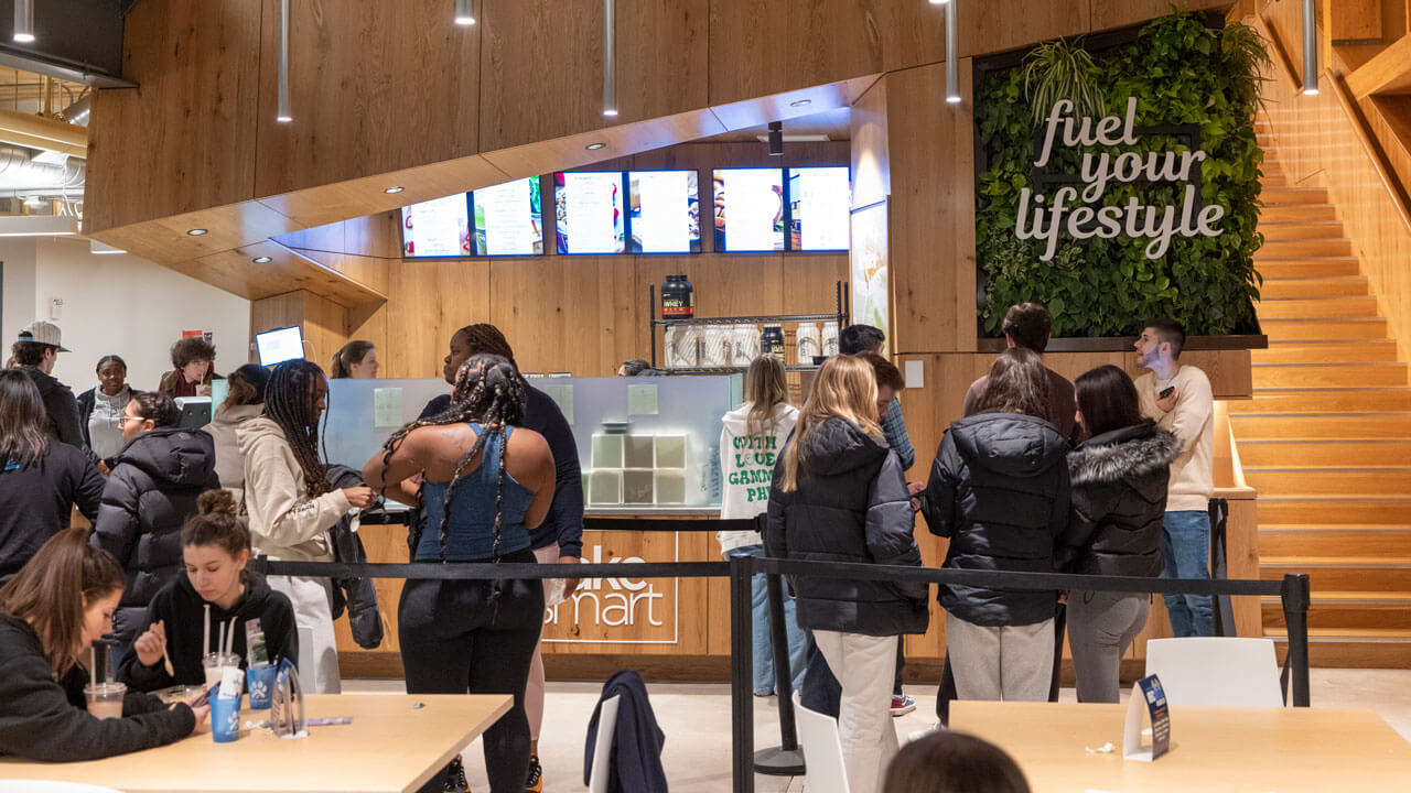 Students line up at ShakeSmart to order food and drinks at RecWell.