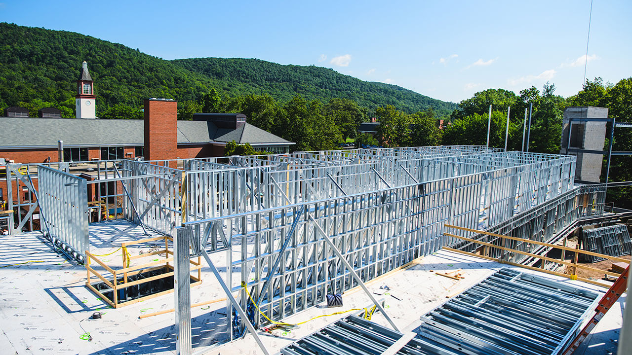 A view of the new South Quad construction project with Sleeping Giant in the background