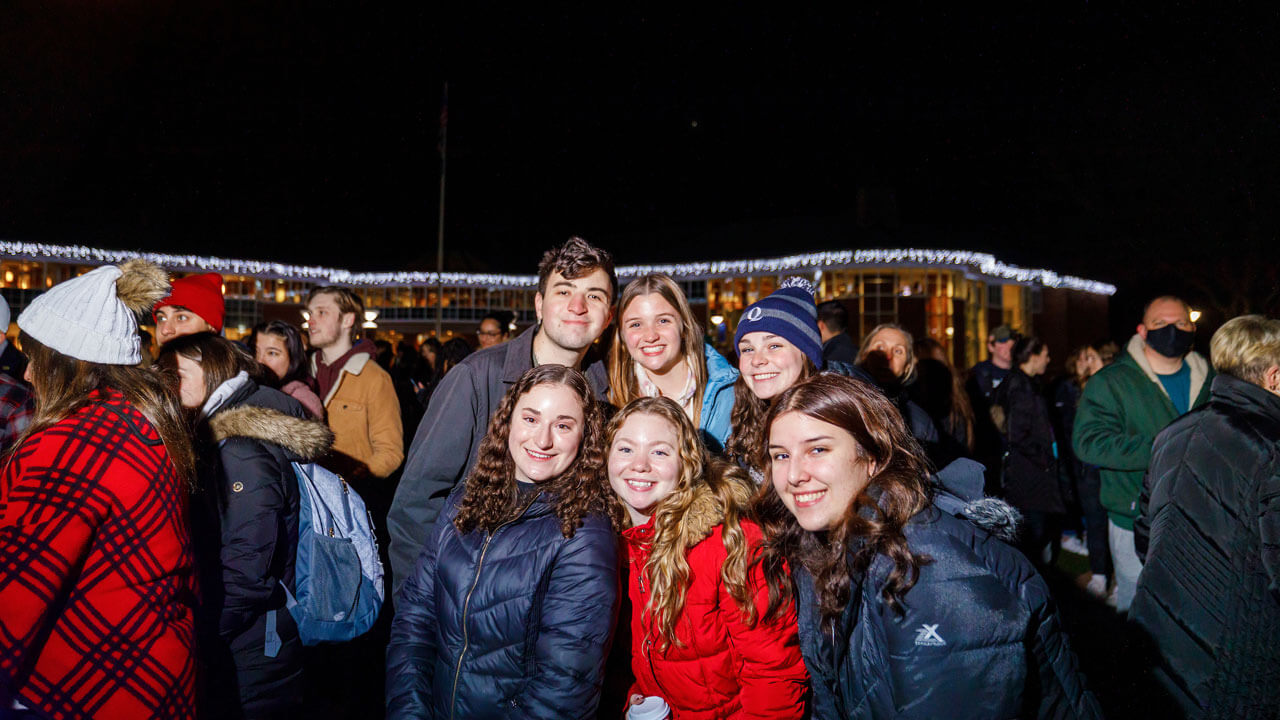 Students smiling and joyful after Quad Lighting