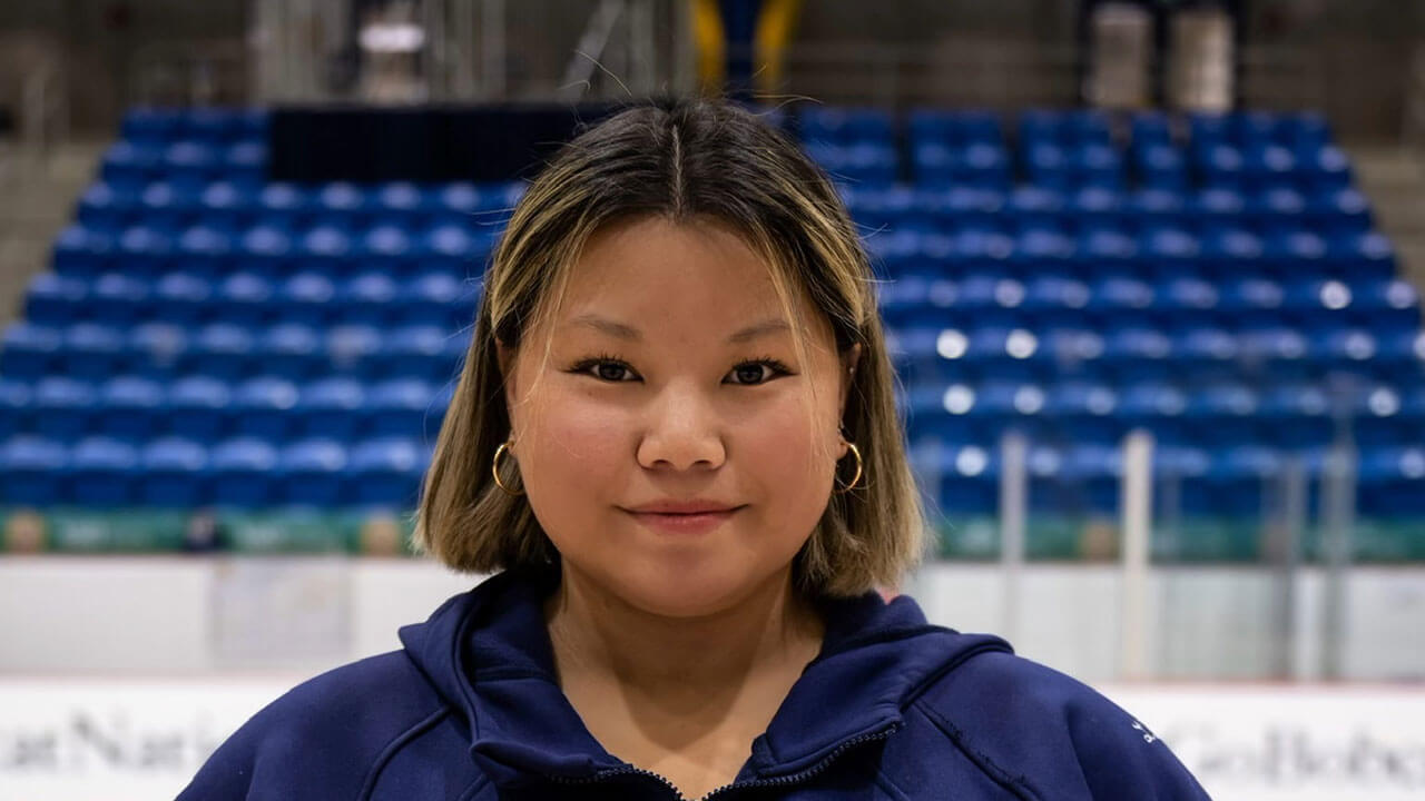 Headshot of Laine Dubin on Quinnipiac's Ice Rink.