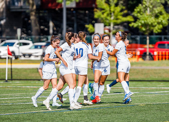 Women’s club soccer team playing in a game