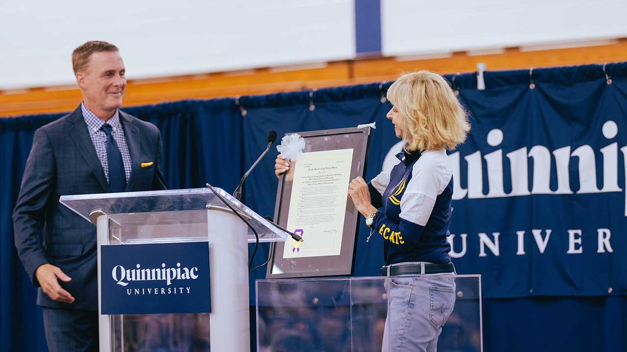 President Judy Olian and Coach Rand Pecknold