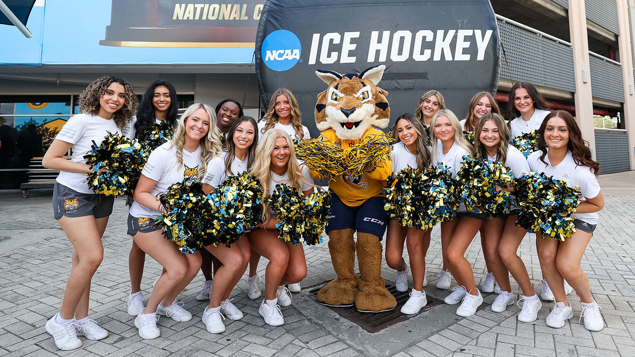 Ice Cats cheer with Boomer.