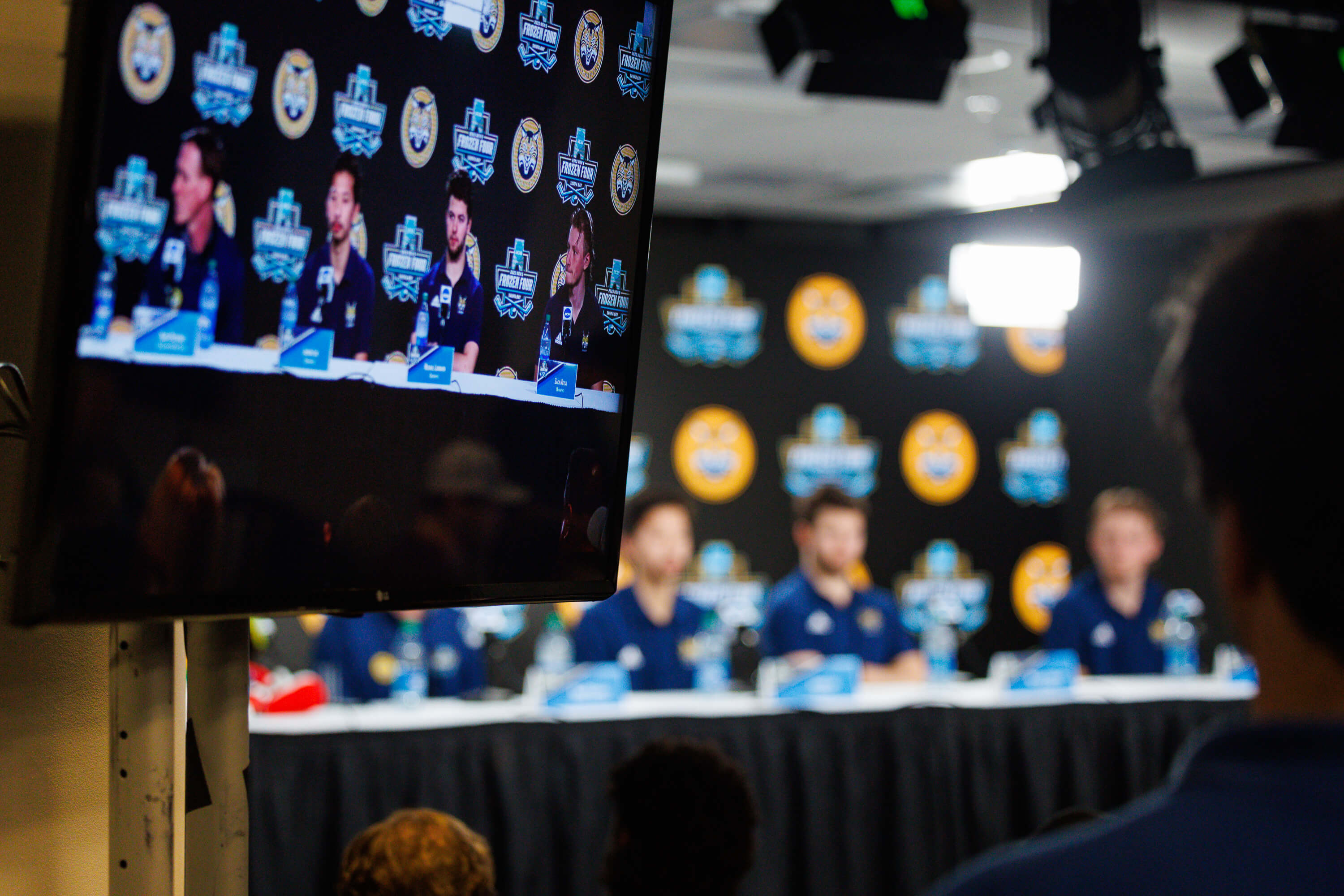 Men's ice hockey team participate in the press conference.