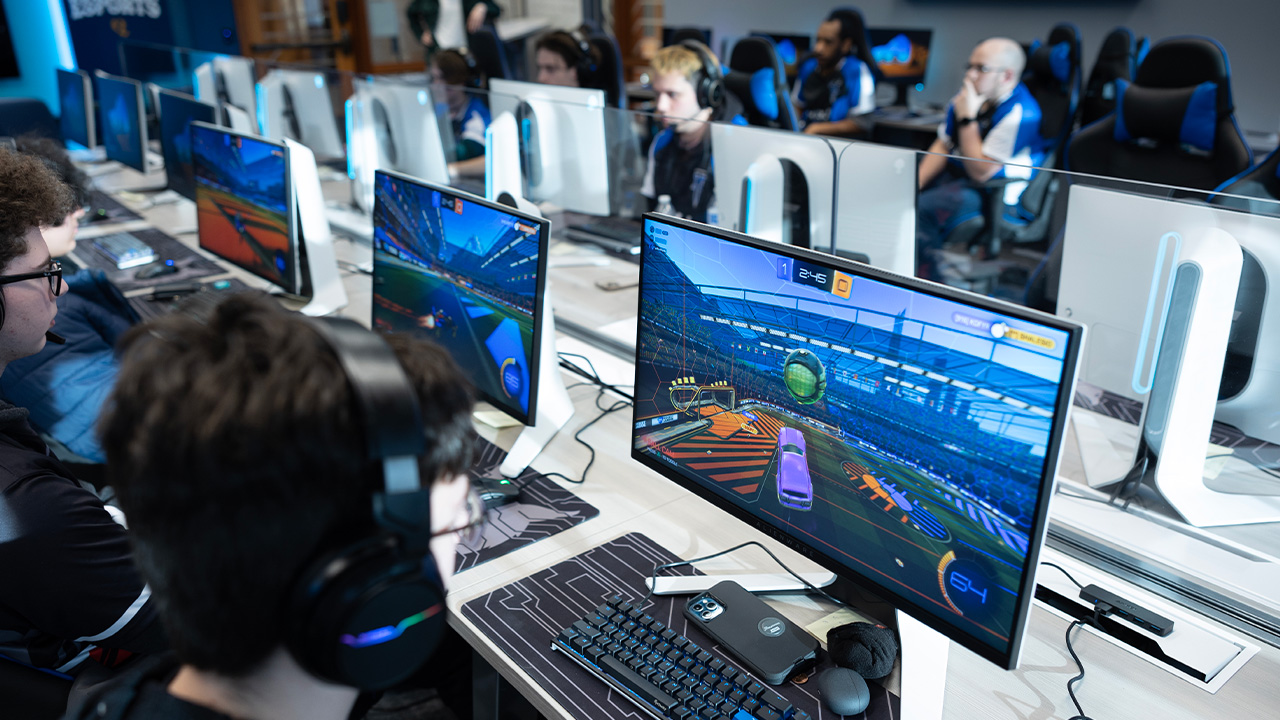 An eSports athlete uses a computer in Quinnipiac's eSports lab.