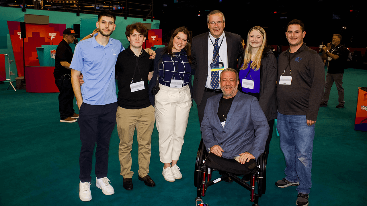 Quinnipiac students who attended Super Bowl LVII press week pose for a group photo,