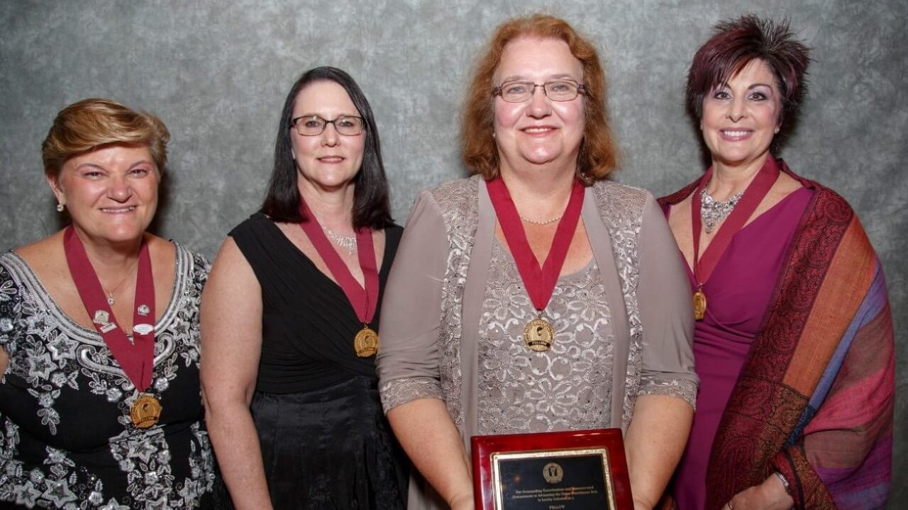 Professor Laima Karosas, fellow in the American Academy of Nursing Practitioners, with her sponsors.