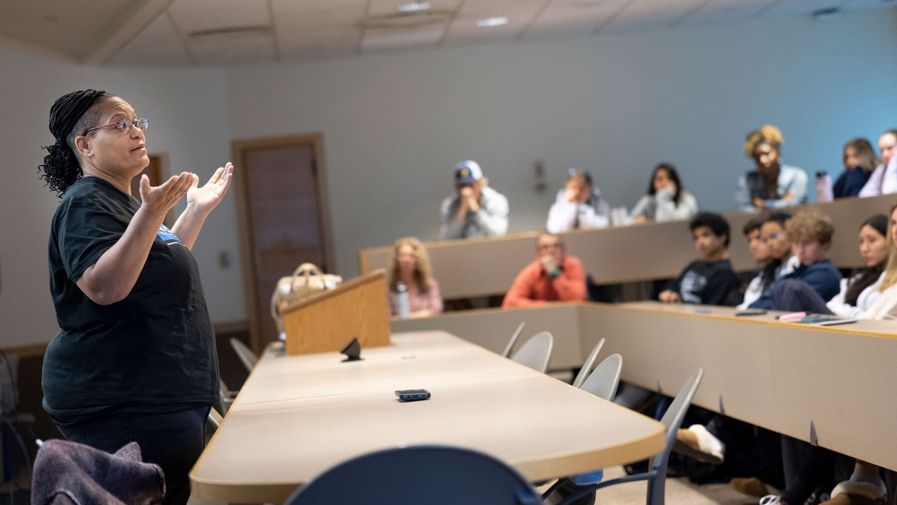 Sabrina Butler gives a presentation to a class.