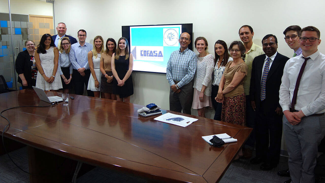 A group of students on a site visit at a local Peruvian company