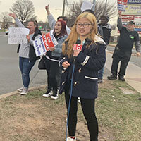 Journalism alumni Nhung An reporting for WTNH News 8