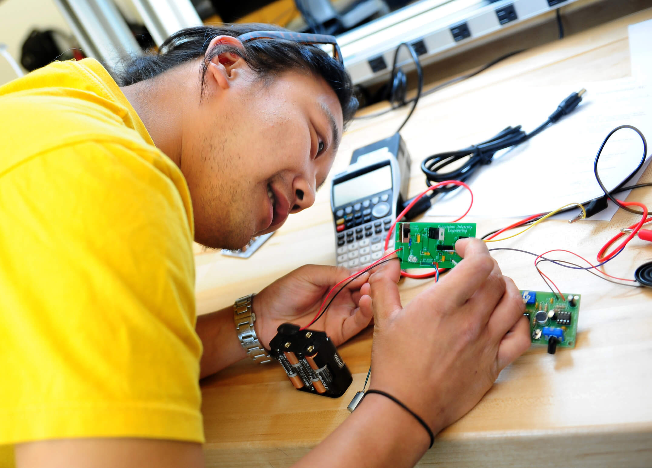 A student getting ready to present his final project during his circuits lab in the School of Engineering.