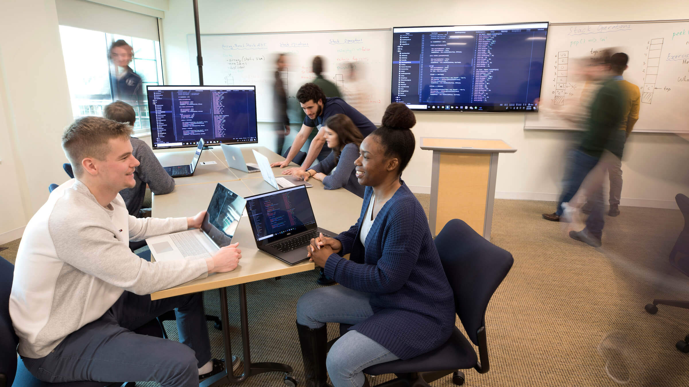 Students in classroom with laptops