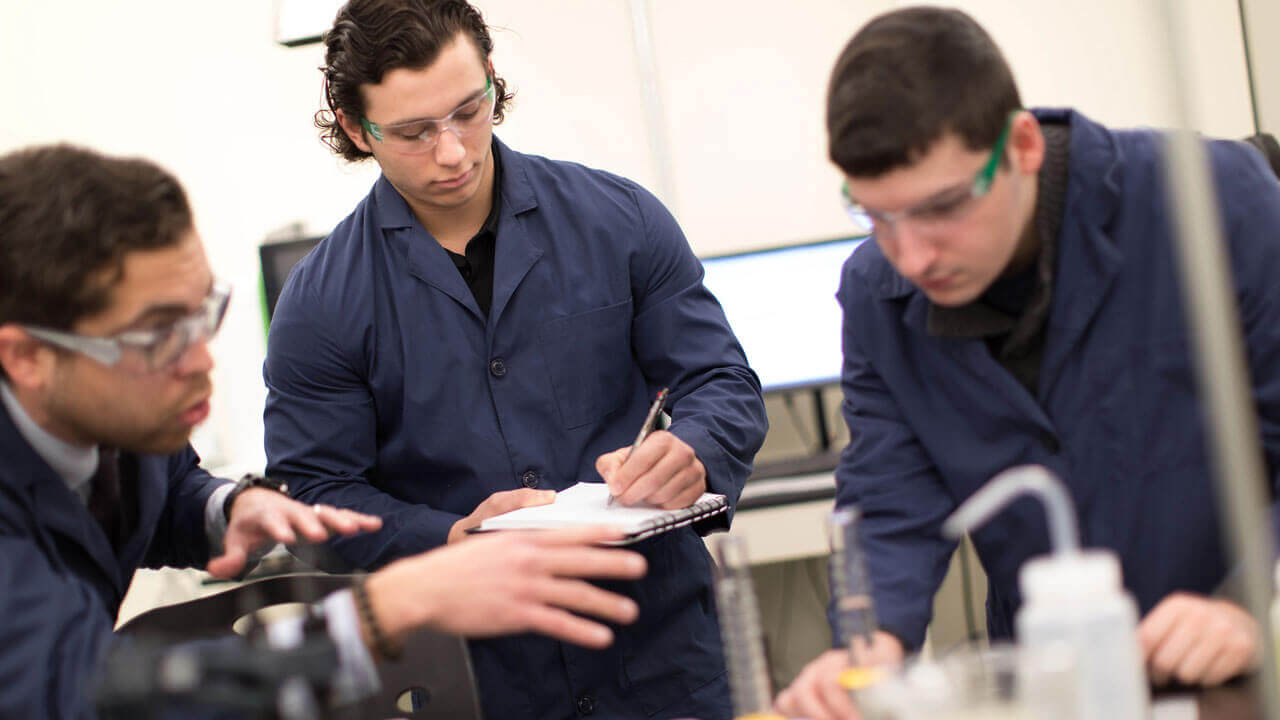 A professor and students performing compression and density tests