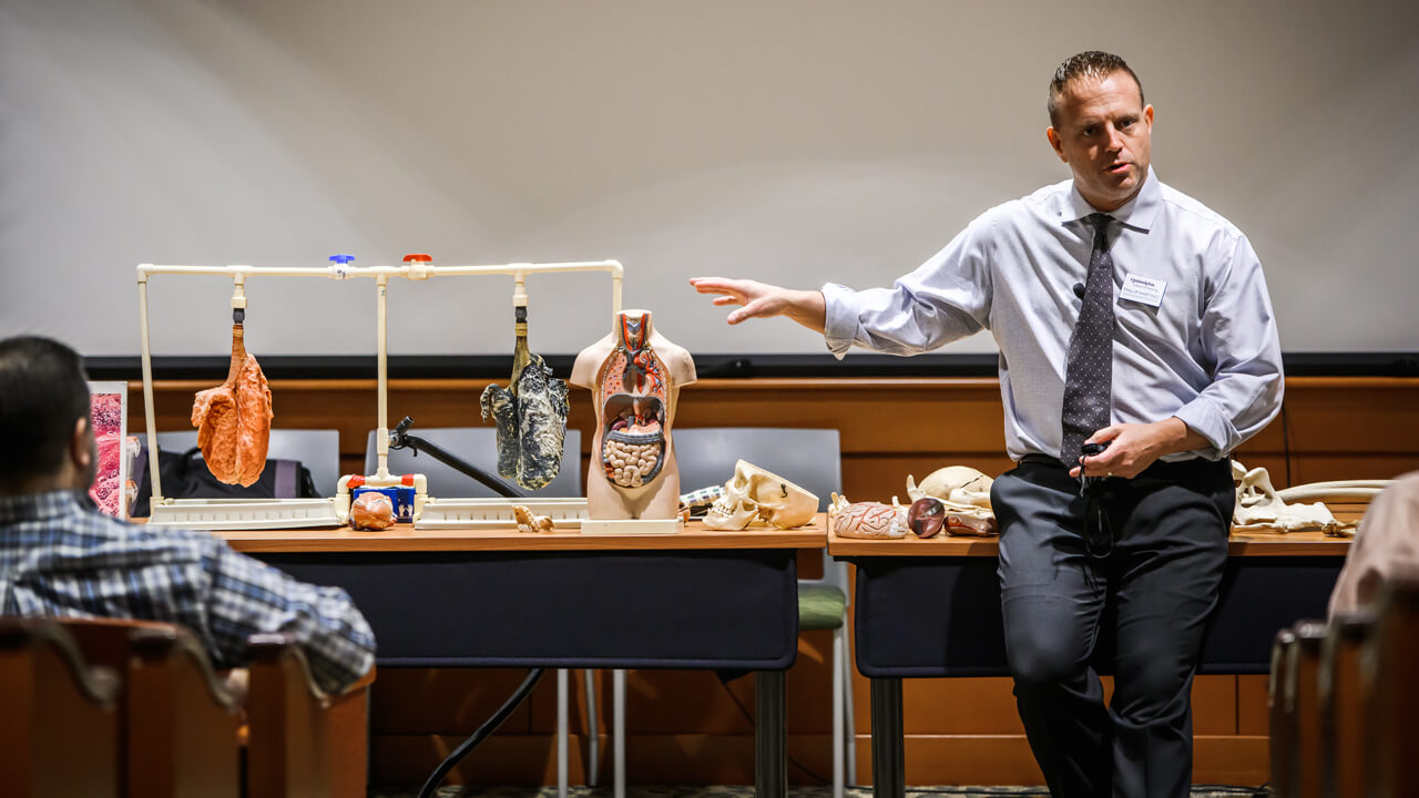 Dr. Philip Martinez gives a presentation during an exploration day session.