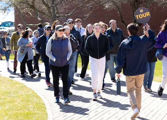 Admitted undergraduate students take a tour of the Mount Carmel campus.