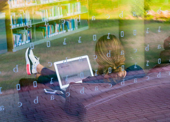 Student studying in the library.