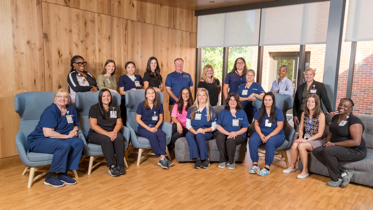 Group photo of Hartford HealthCare providers team in the Recreation and Wellness Center