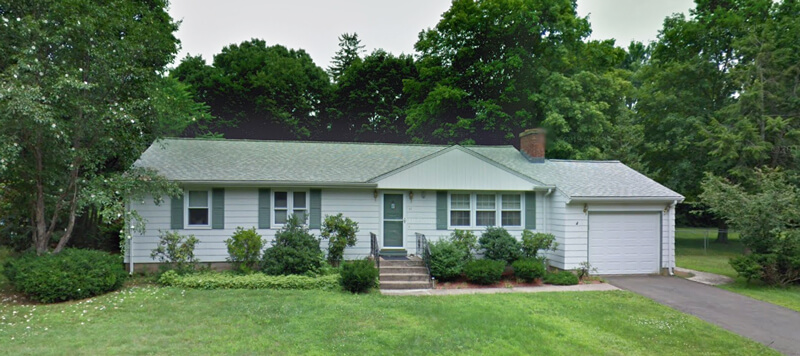 White one-story, one-car garage on 51 Lucien Drive