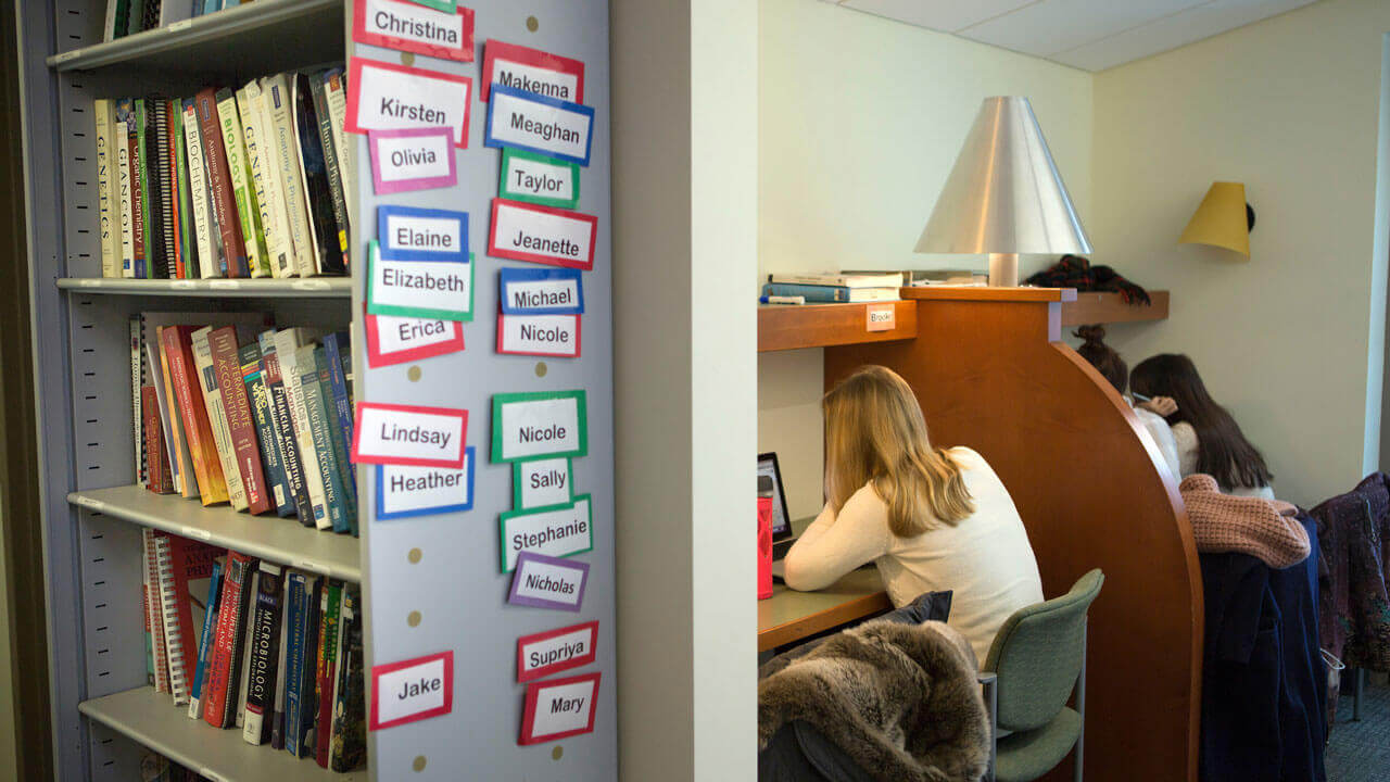 Students studying at individual desks in the Learning Commons