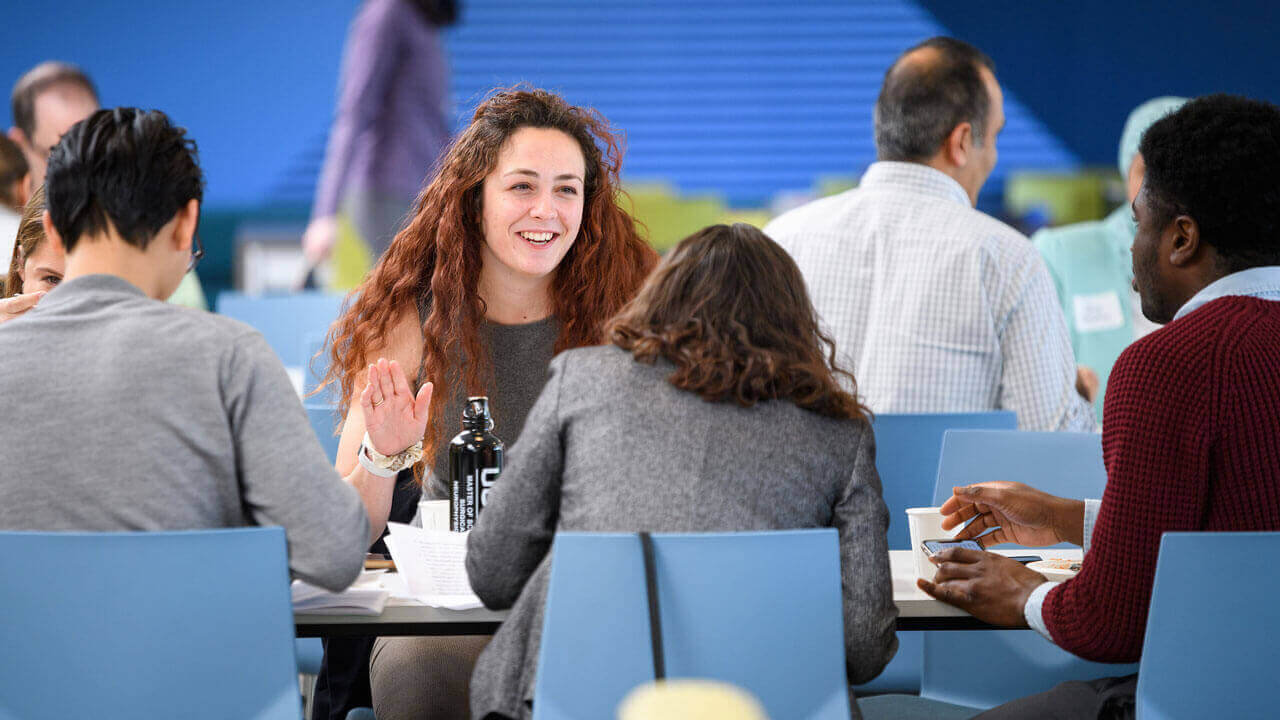 A group of people sitting at a table