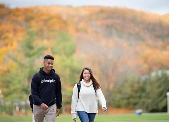 Students walk across the Quad