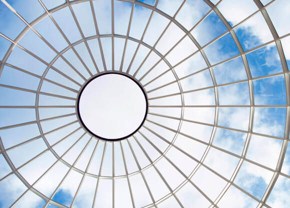 View of the sky through the Lender School of Business Center glass dome