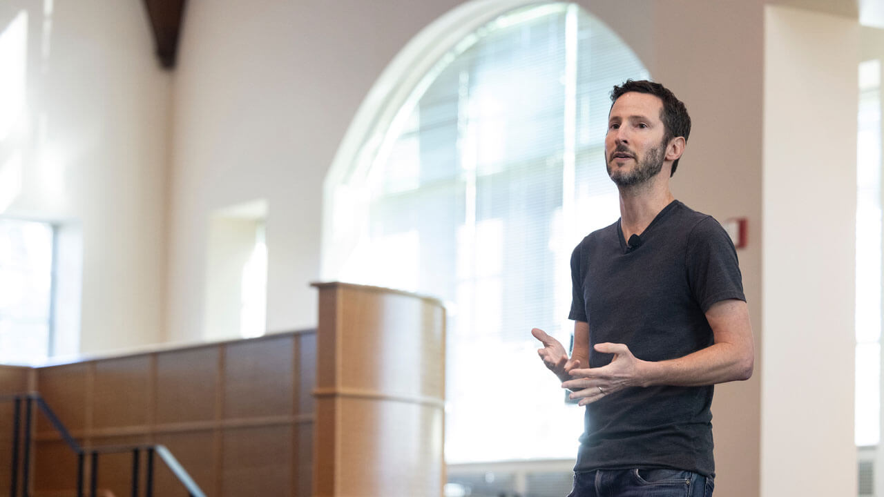 Entrepreneur Magazine Editor and Author Jason Feifer addresses the audience